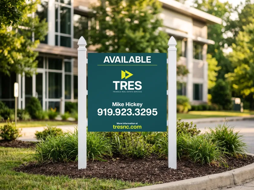 A TRES yard sign in Midnight Green shows an available property with the stacked logo, Mike Hickey's name and number, and the tresnc.com address.