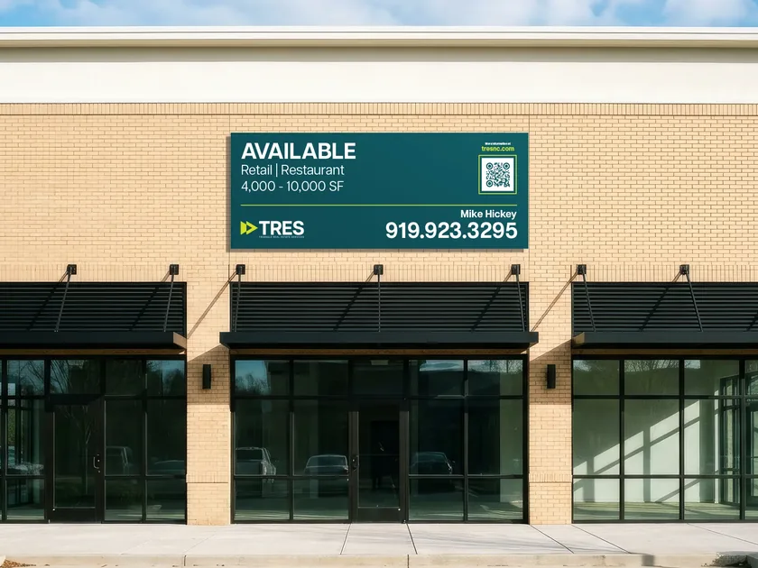 A TRES leasing banner on a brick retail building shows retail and restaurant space from 4,000 to 10,000 square feet.